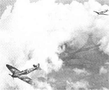 Spitfire a ser perseguido por um caça alemão em plena Batalha de Inglaterra.